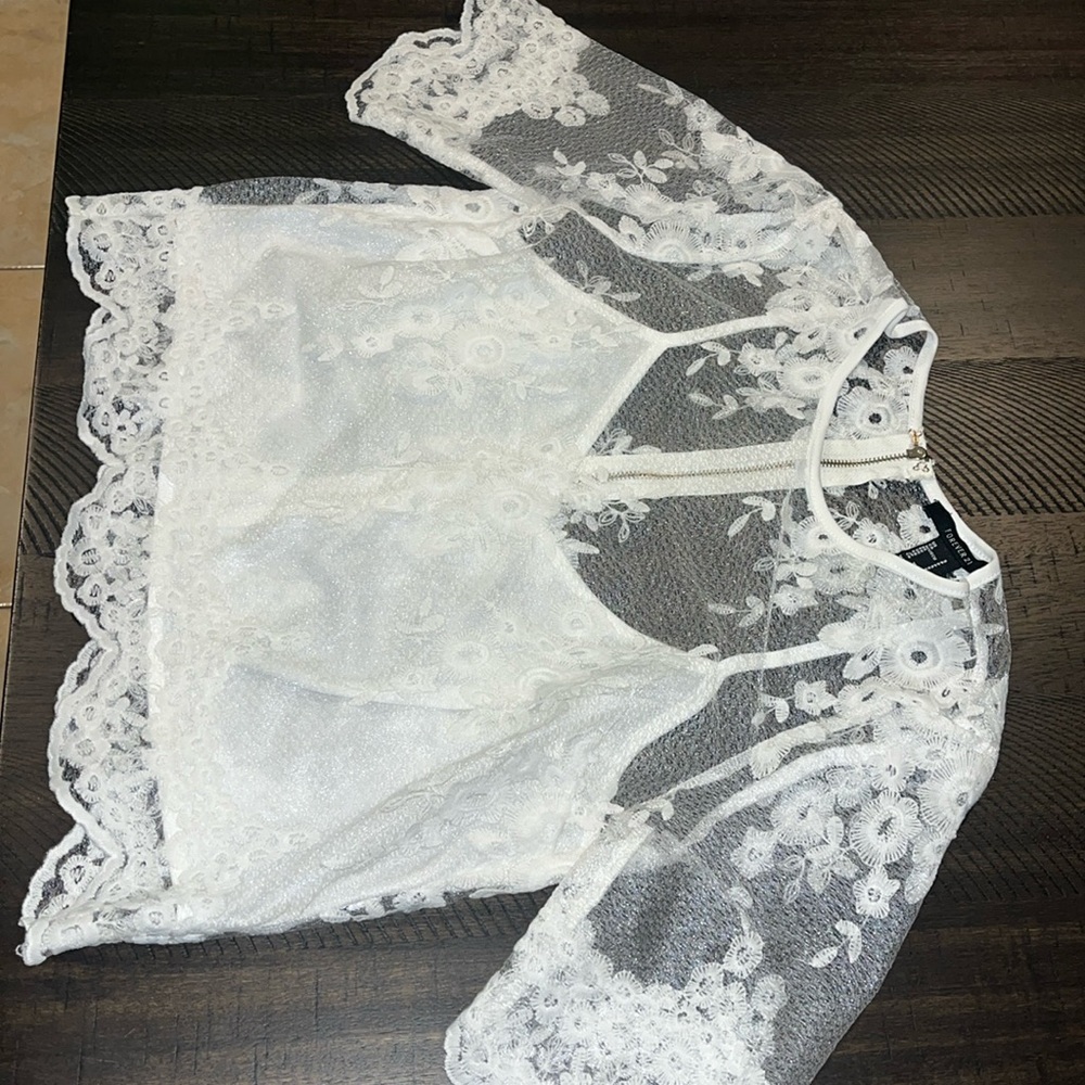 Elegant sheer and embroidered blouse